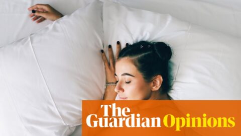 young woman sleeping in bed