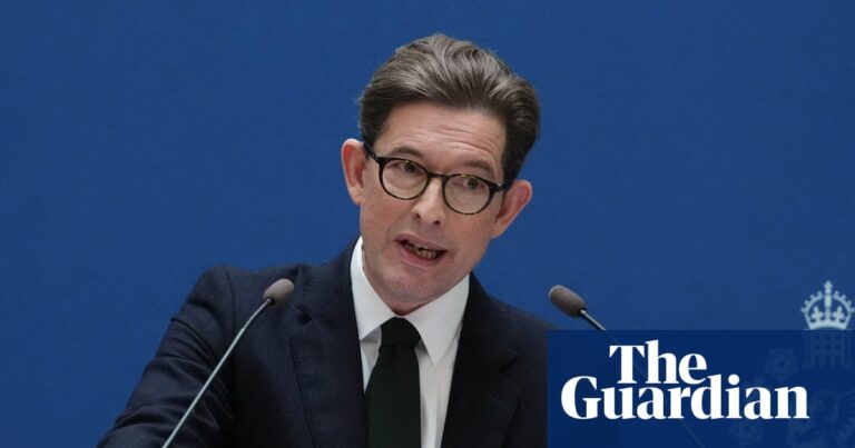 Ken McCallum speaking at a lectern